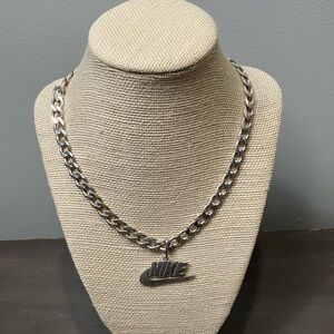 Vintage 1990’s Sterling Silver Curb Chain and Nike Pendant!